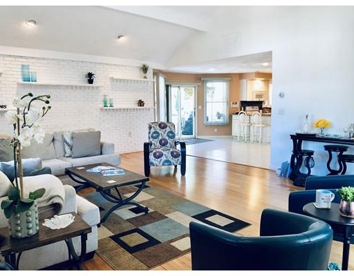 4 Rivers Lane Stoneham, MA 02180 - Photo 11 of 42 a living room with furniture and wooden floor