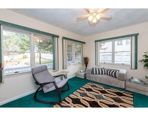 4 Rivers Lane Stoneham, MA 02180 - Photo 19 of 42 a living room with furniture and a large window
