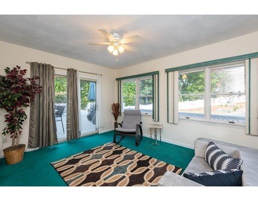 4 Rivers Lane Stoneham, MA 02180 - Photo 20 of 42 a bedroom with furniture and a large window