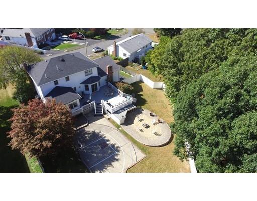 4 Rivers Lane Stoneham, MA 02180 - Photo 3 of 42 a black and white photo of a house