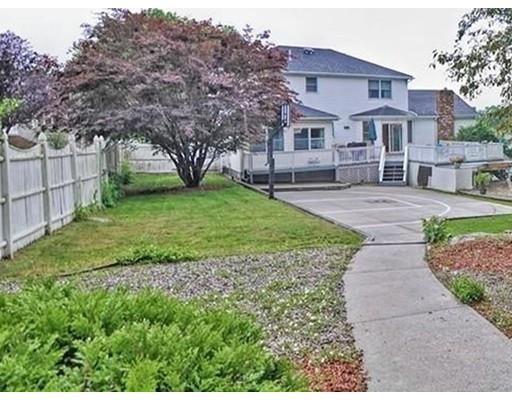 4 Rivers Lane Stoneham, MA 02180 - Photo 38 of 42 a front view of a house with garden