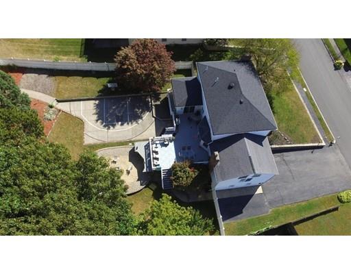 4 Rivers Lane Stoneham, MA 02180 - Photo 42 of 42 a black and white photo of a house