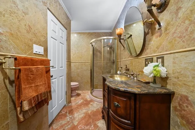 a bathroom with a sink a toilet and bathtub