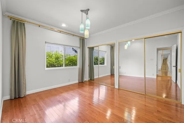 a view of a hallway with washer and dryer