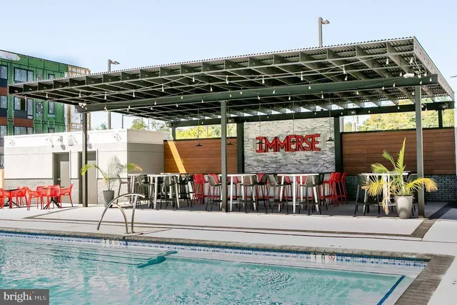 a view of a tables and chairs in a room