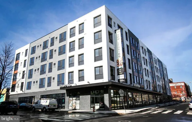 a bed room with furniture and a fireplace