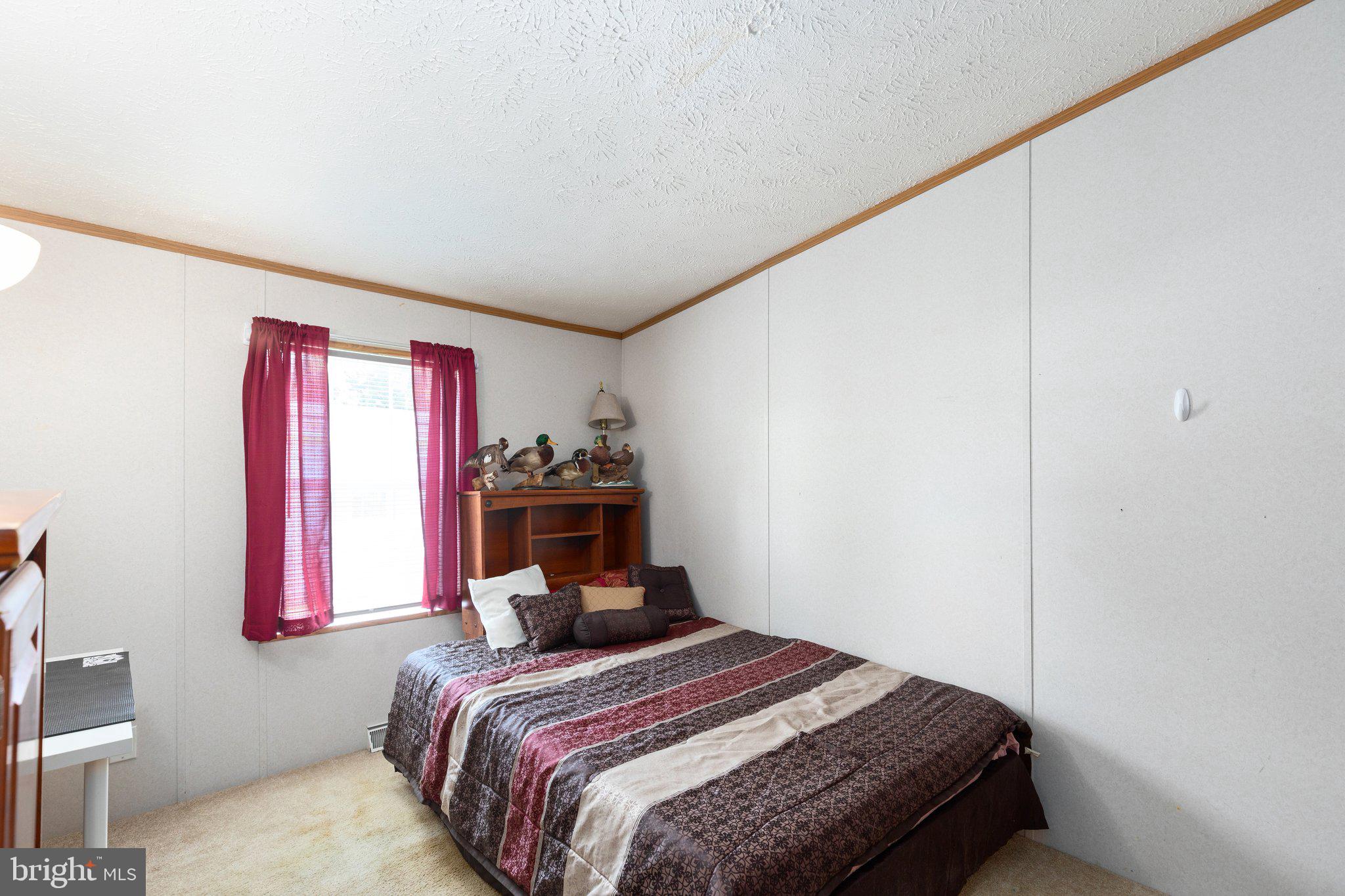 4041 Conowingo Road, Unit 29A Darlington, MD 21034 - Photo 19 of 21 a bedroom with a bed and window