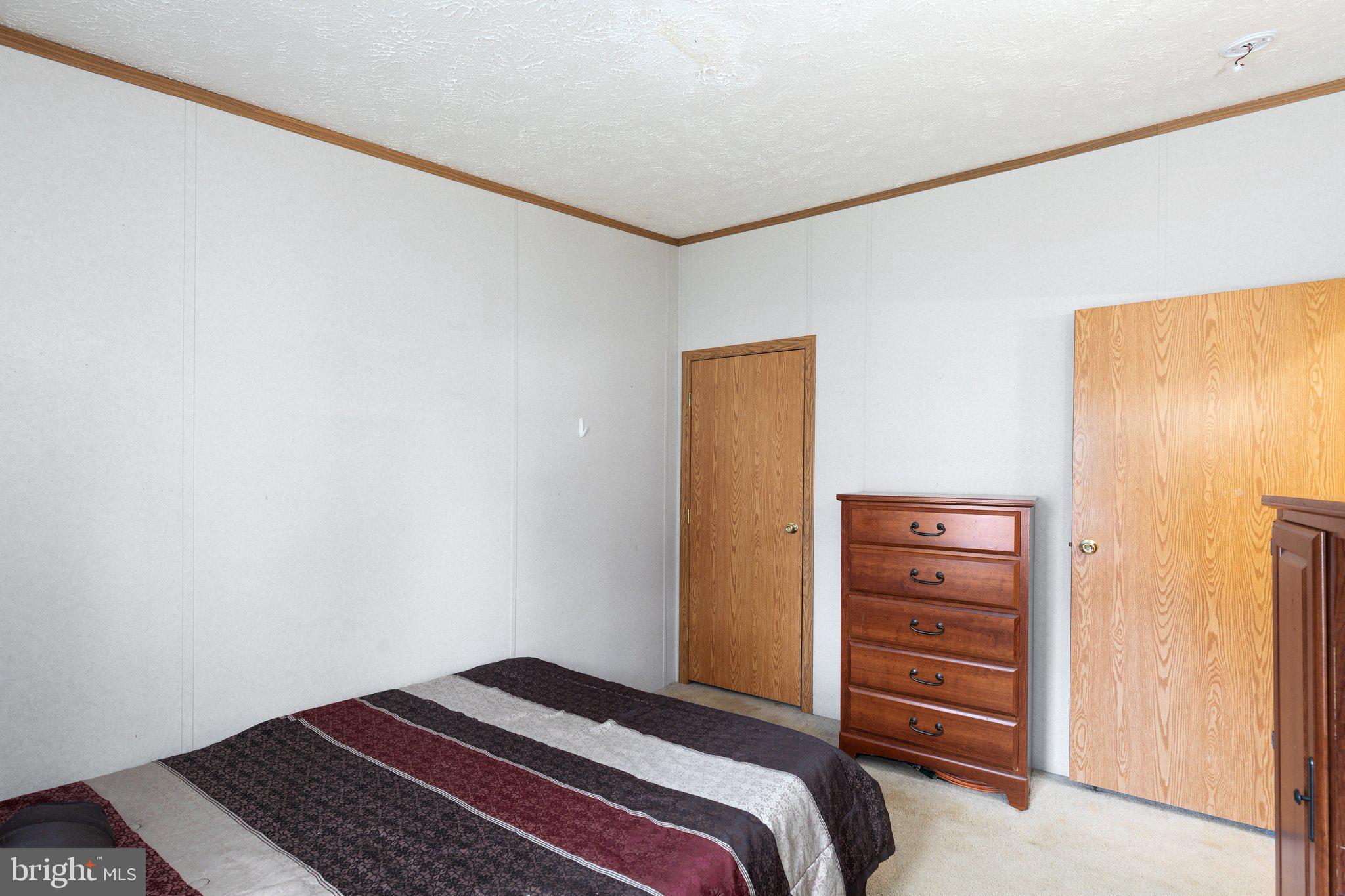 4041 Conowingo Road, Unit 29A Darlington, MD 21034 - Photo 20 of 21 a bedroom with a bed and a closet