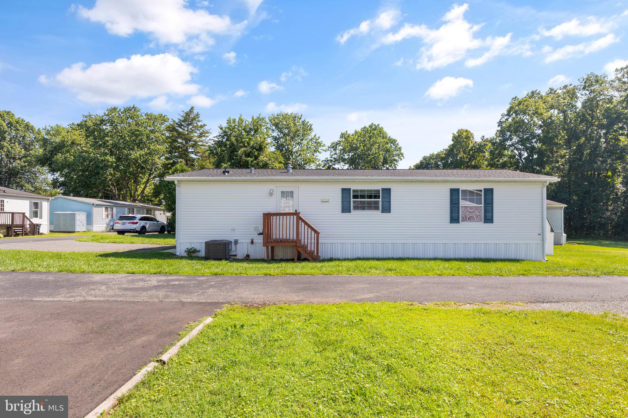 4041 Conowingo Road, Unit 29A Darlington, MD 21034 - Photo 21 of 21 a view of a house with pool and a yard