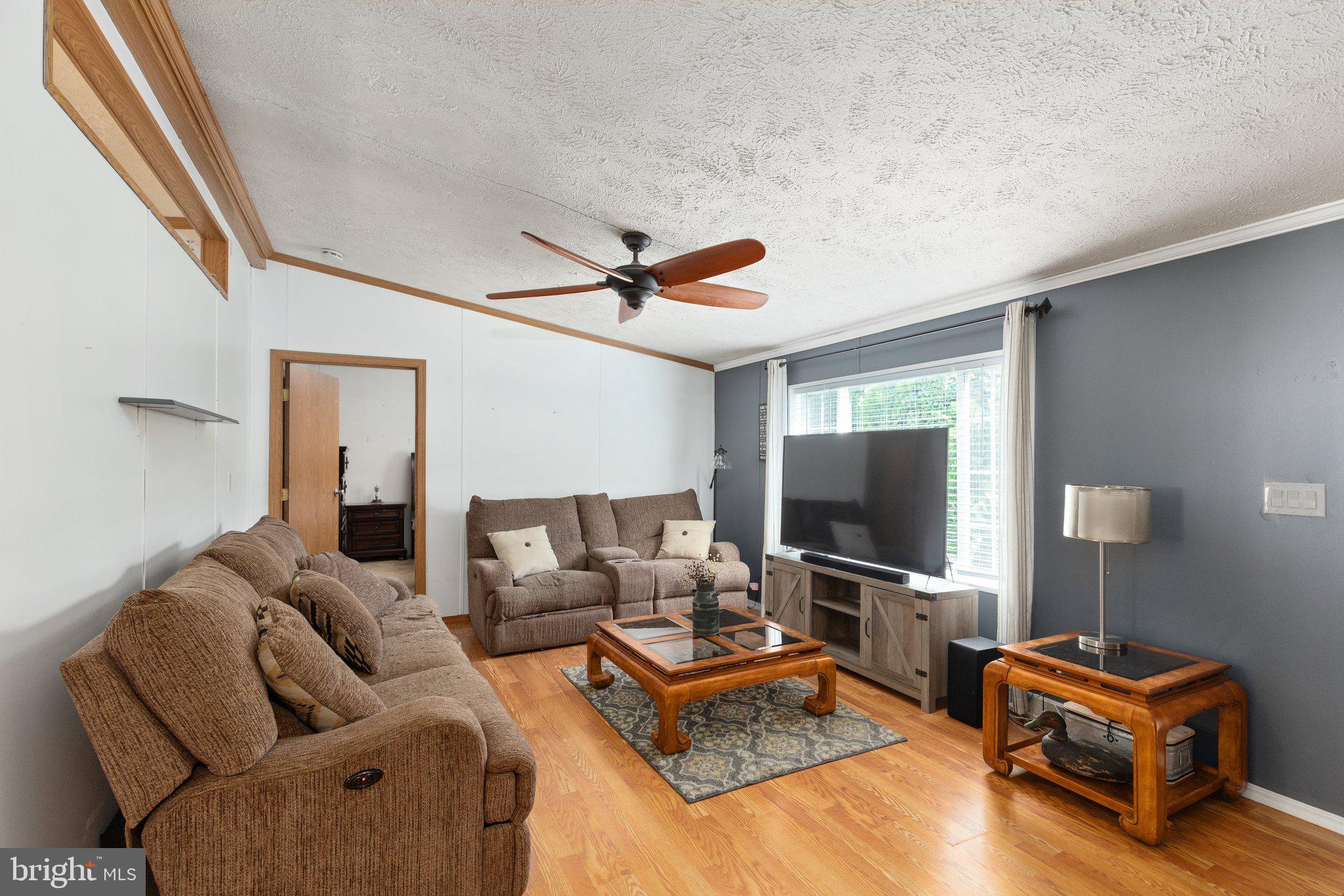 4041 Conowingo Road, Unit 29A Darlington, MD 21034 - Photo 5 of 21 a living room with furniture and a flat screen tv