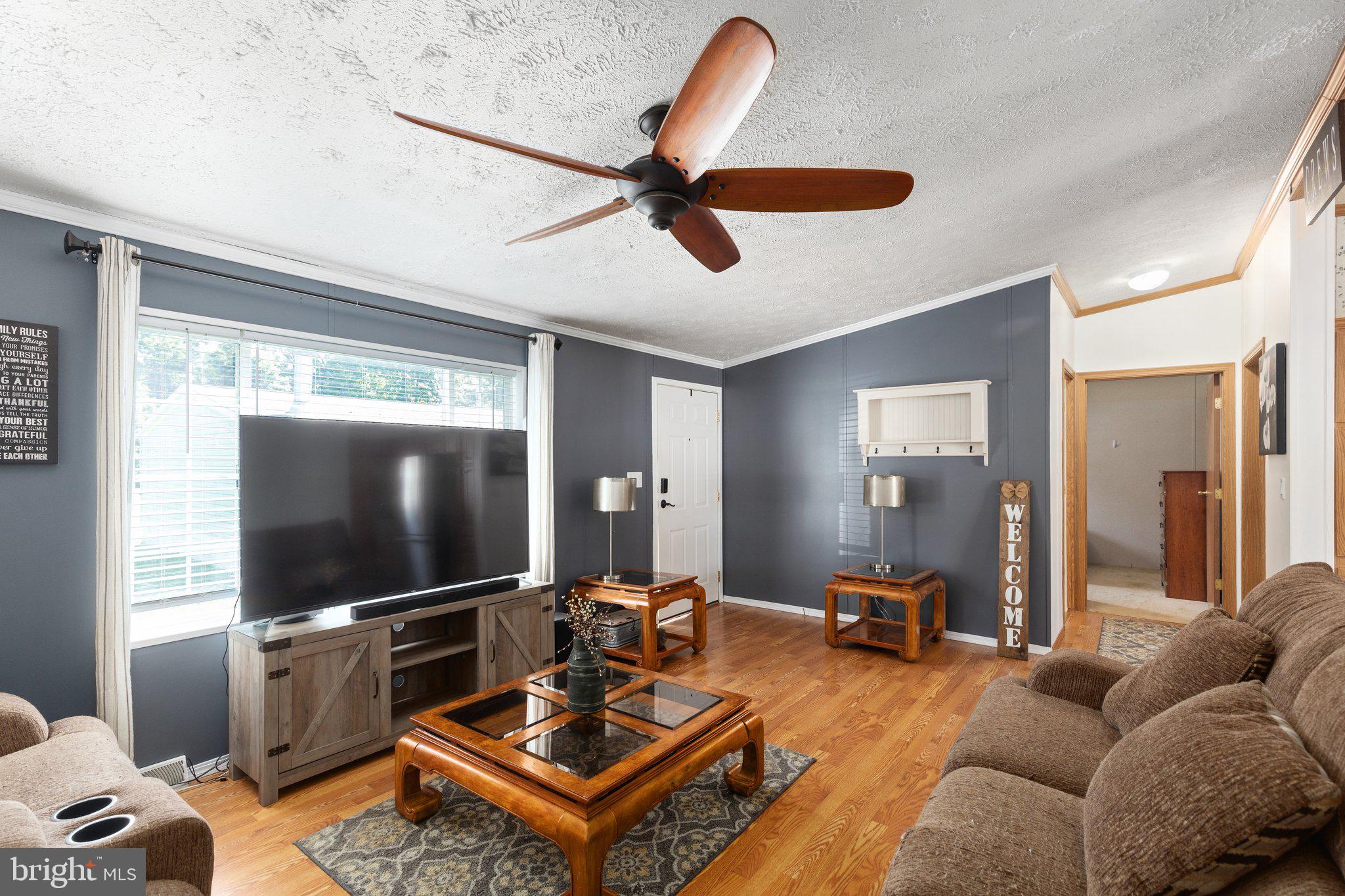 4041 Conowingo Road, Unit 29A Darlington, MD 21034 - Photo 6 of 21 a living room with furniture and a flat screen tv