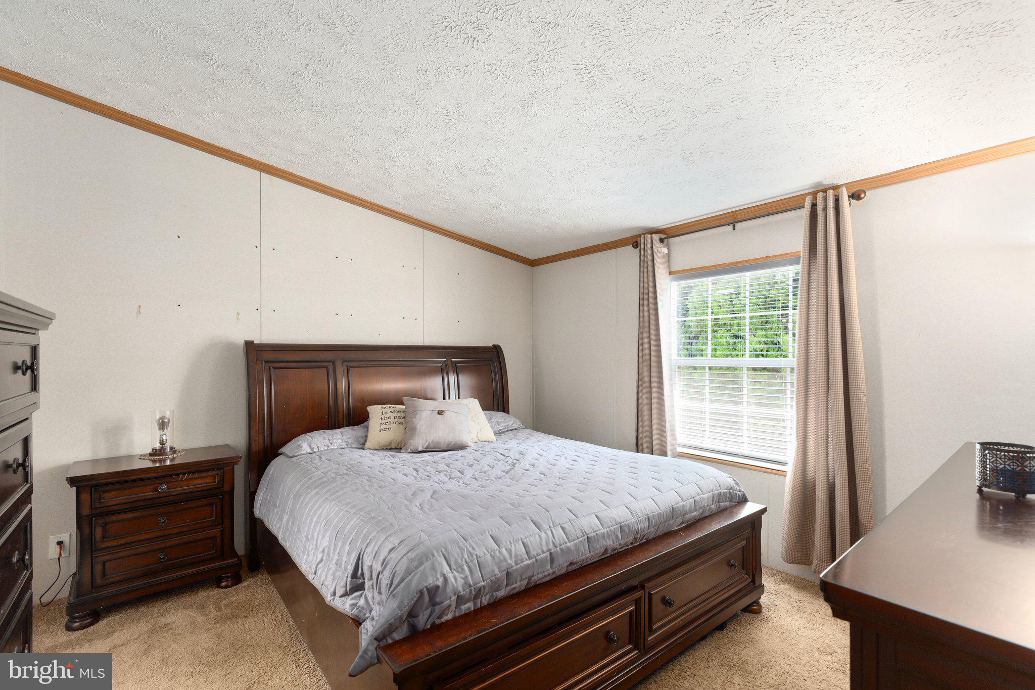 4041 Conowingo Road, Unit 29A Darlington, MD 21034 - Photo 10 of 21 a bedroom with a bed and wooden floor