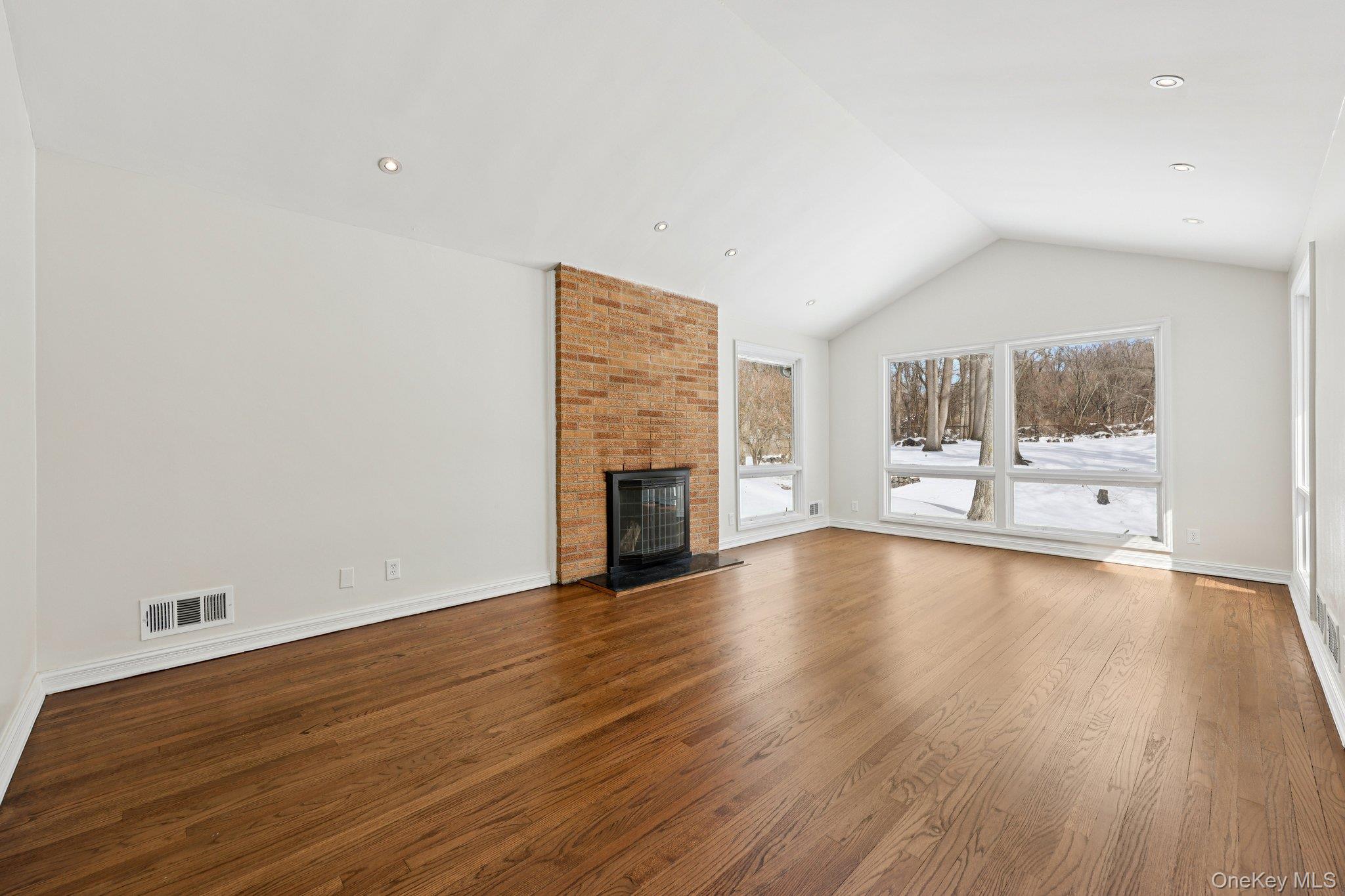 11 Meadowlark Road Rye Brook, NY 10573 - Photo 6 of 34 Living Room with hardwood floors and cathedral ceilings