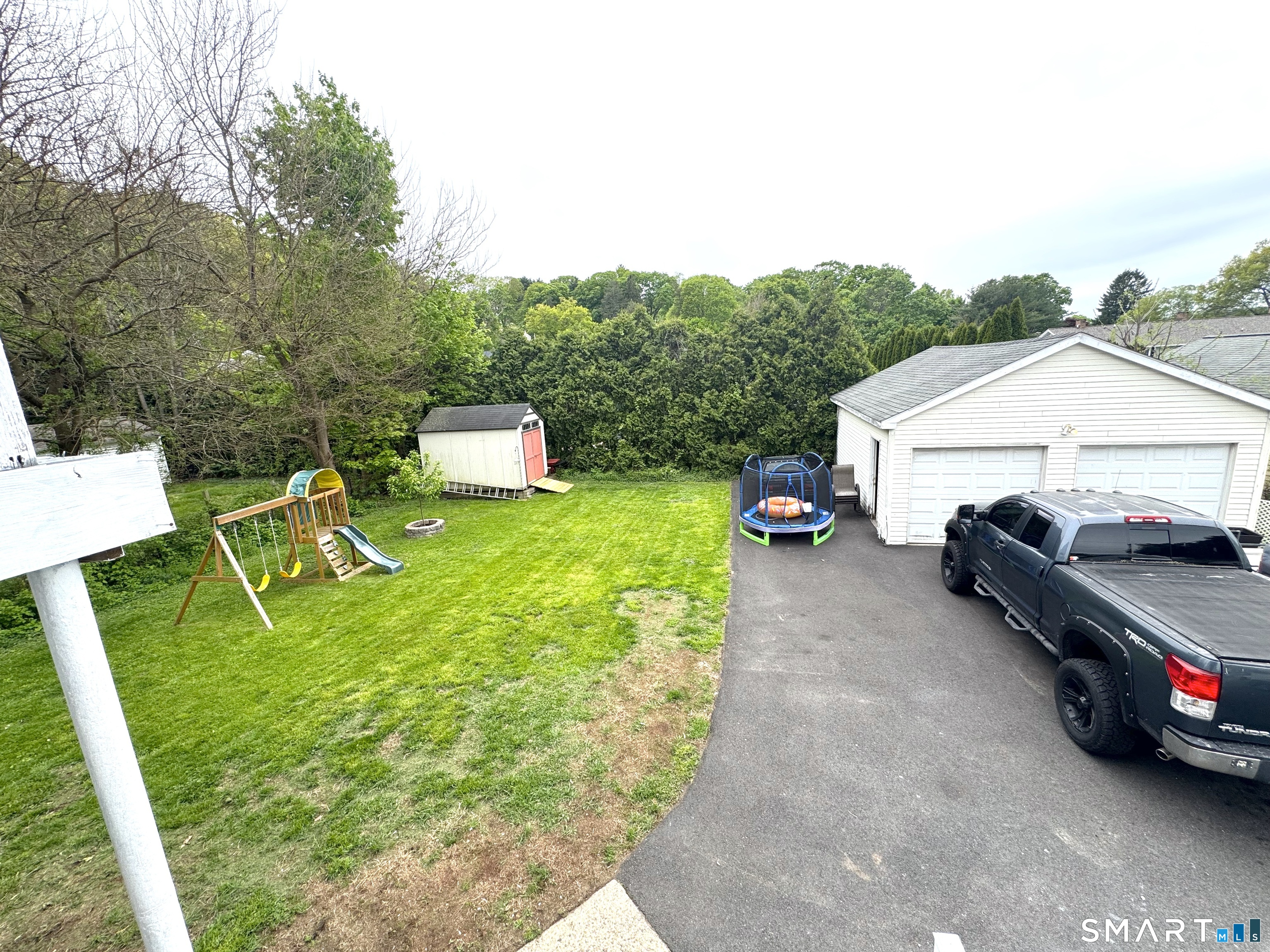 6-8 Vose Street Ansonia, CT 06401 - Photo 4 of 37 Oversized two car garage with ample space and electrical power. A car guy's dream!