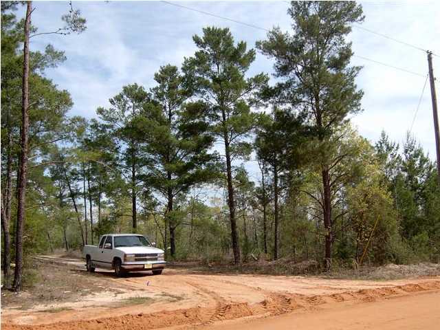 E-5 Thrush Place Crestview, FL 32539 - Photo 3 of 3 a car parked on the side of a road