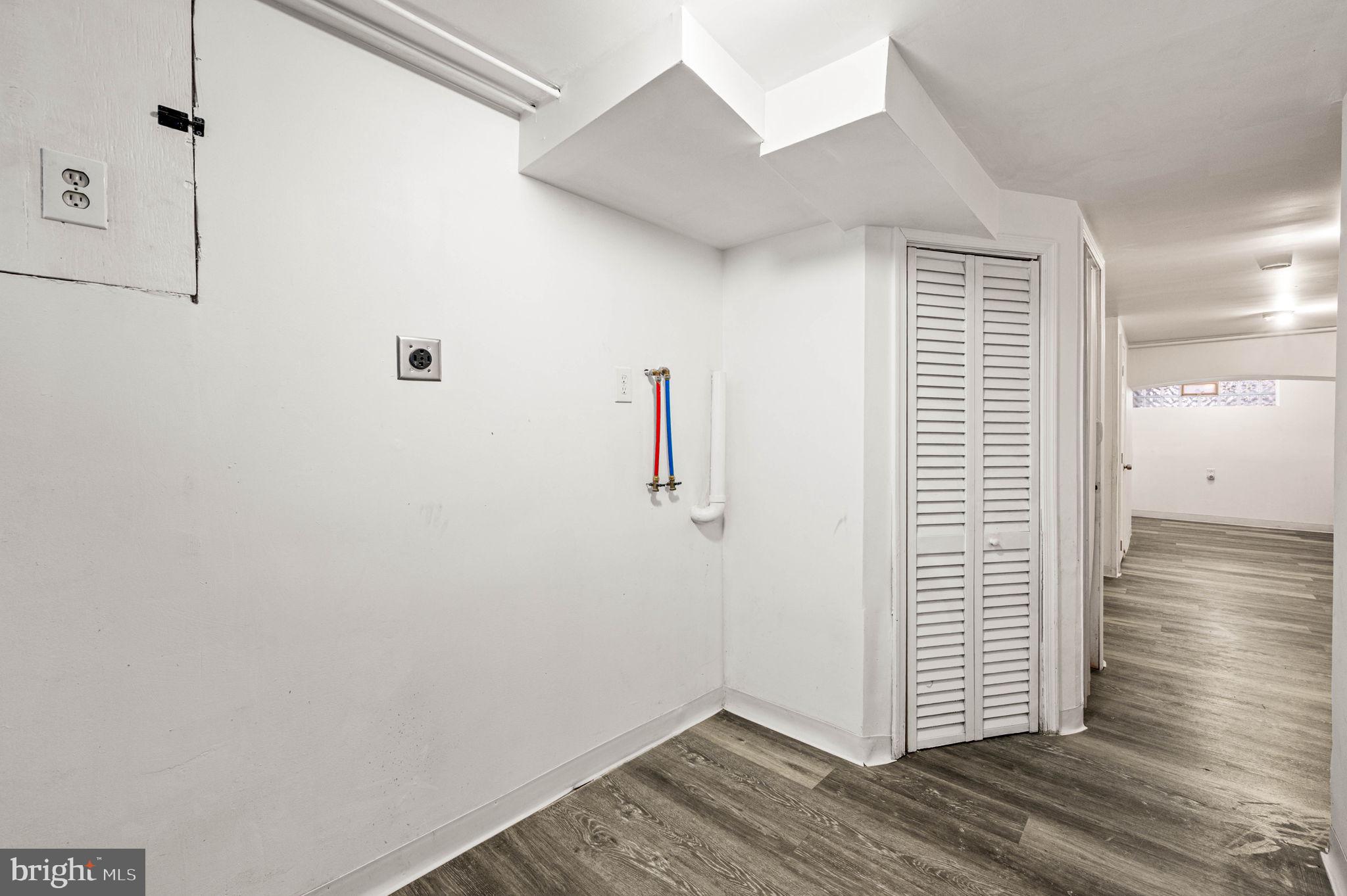 7113 Theodore Street Philadelphia, PA 19142 - Photo 22 of 26 a view of hallway with wooden floor