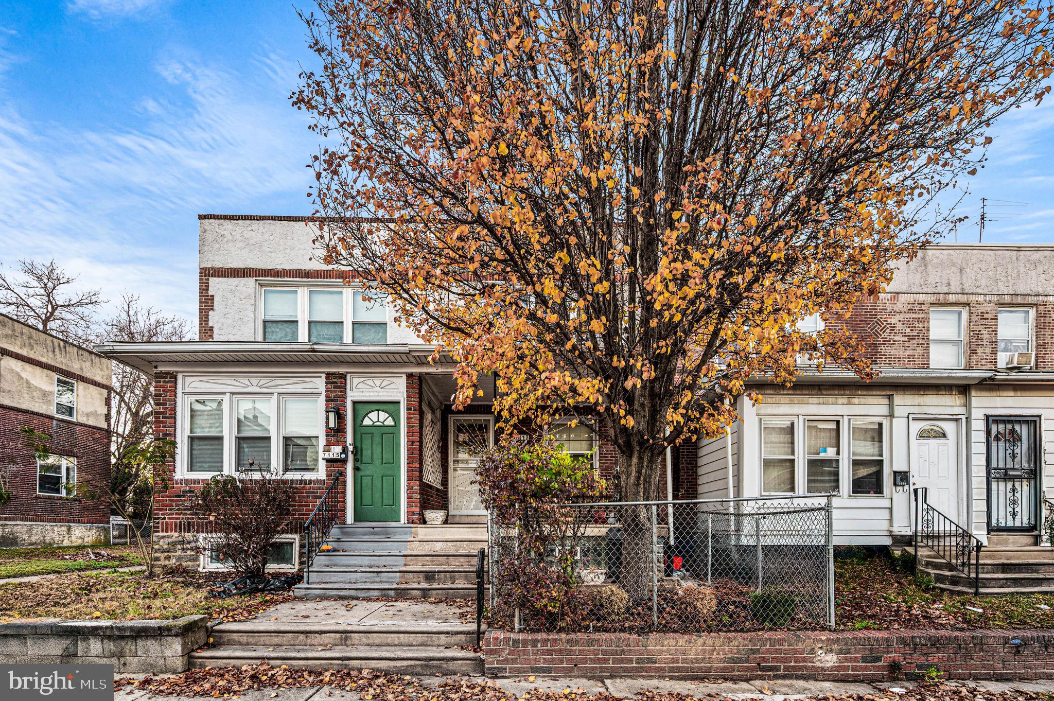 7113 Theodore Street Philadelphia, PA 19142 - Photo 26 of 26 front view of a house with a tree