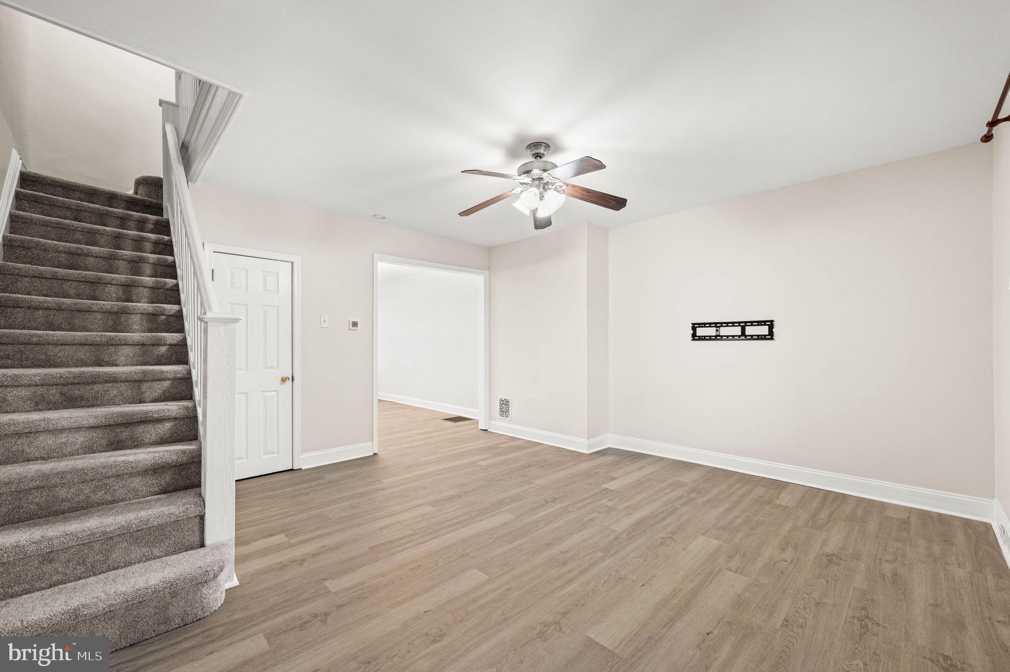 7113 Theodore Street Philadelphia, PA 19142 - Photo 5 of 26 a view of an empty room with a window