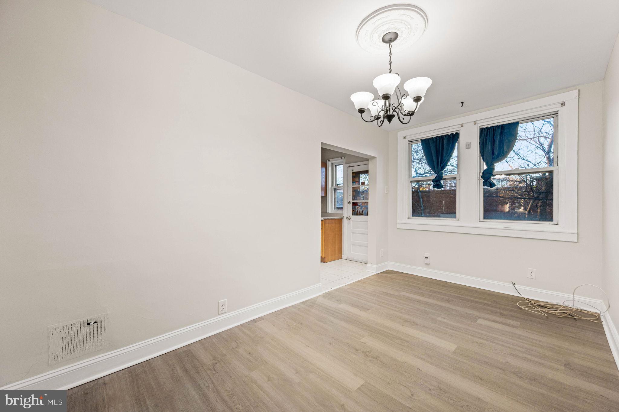 7113 Theodore Street Philadelphia, PA 19142 - Photo 8 of 26 a view of an empty room with a window