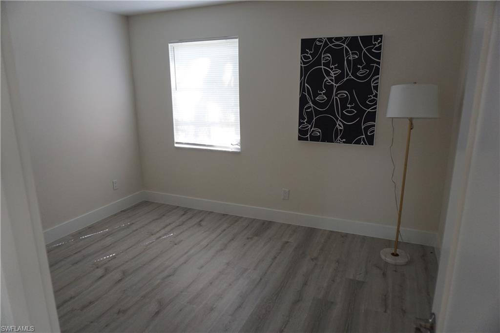 663 12th Avenue South, Unit 663 Naples, FL 34102 - Photo 14 of 14 an empty room with a window