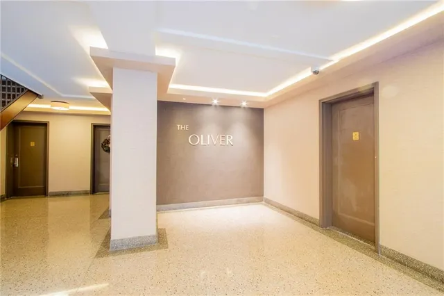 a view of a building with potted plants