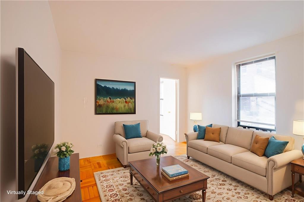 35 Oliver Street, Unit 1D Brooklyn, NY 11209 - Photo 4 of 23 a living room with furniture and a window