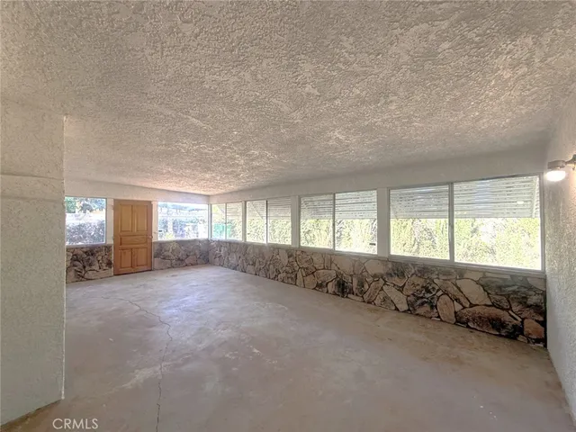 a view of a livingroom with furniture