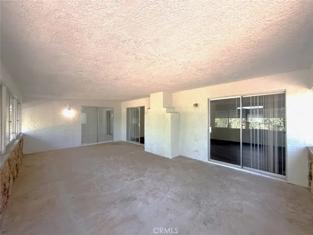 a house view with a backyard space