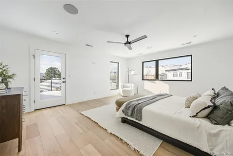 a large spacious bathroom with a large tub and shower