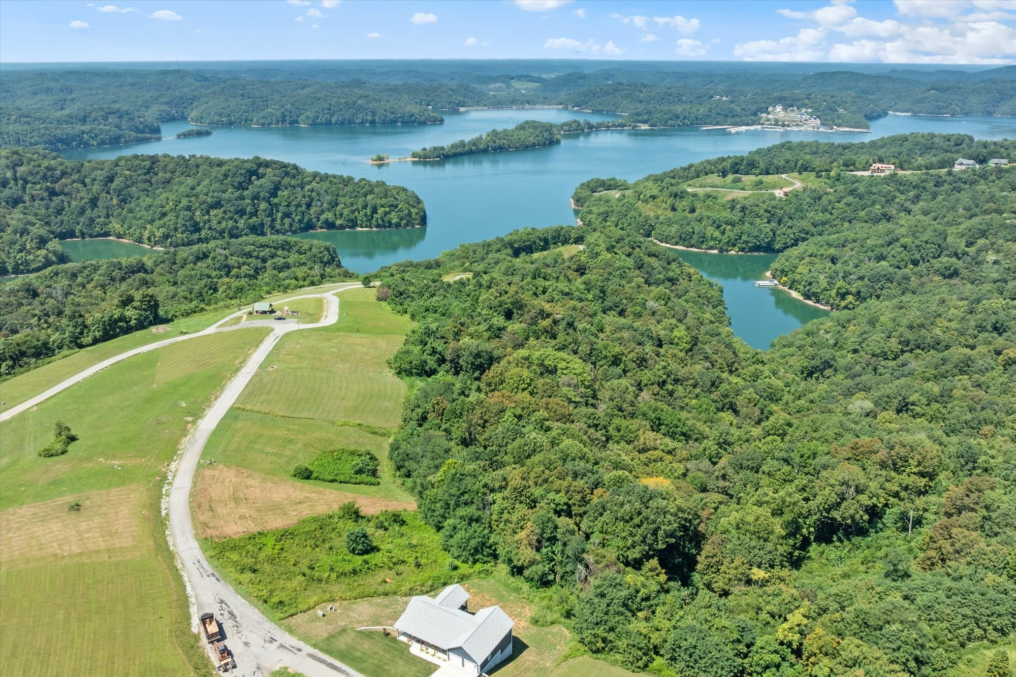 0 Mallard Road Celina, TN 38551 - Photo 6 of 8 a view of a lake with a yard