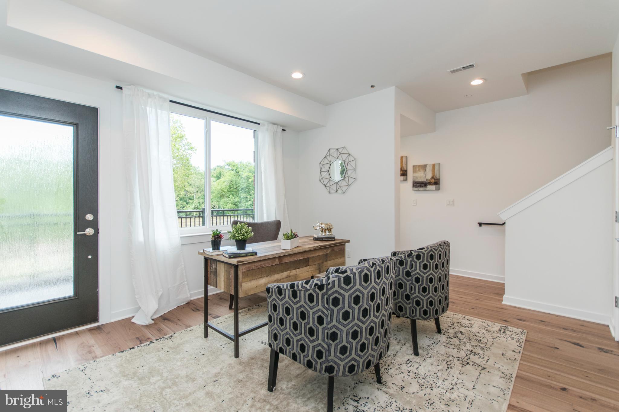4443 River Ridge Court, Unit 13 Philadelphia, PA 19129 - Photo 15 of 35 a workspace with furniture and window