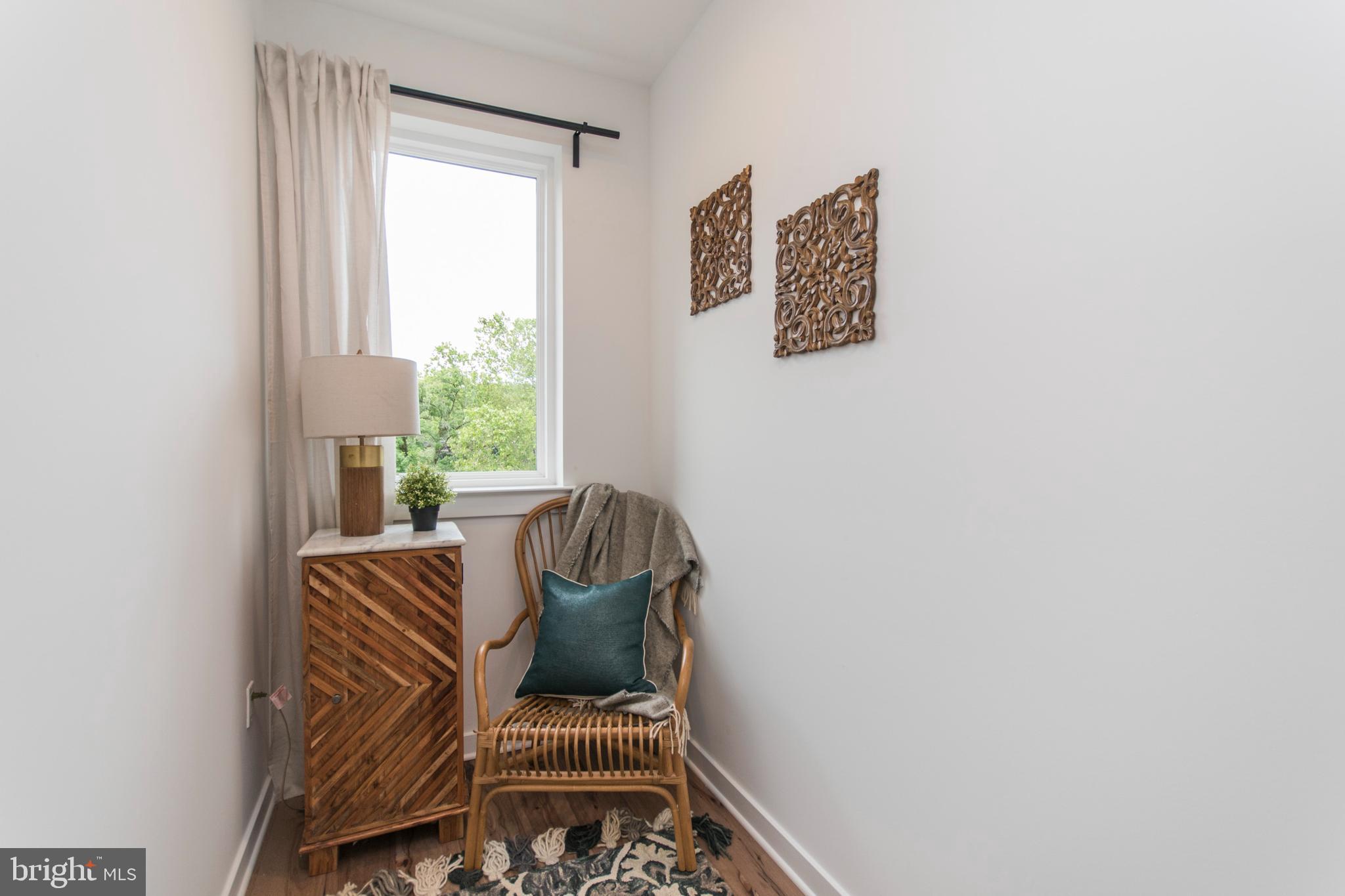 4443 River Ridge Court, Unit 13 Philadelphia, PA 19129 - Photo 23 of 35 a living room with furniture and a window