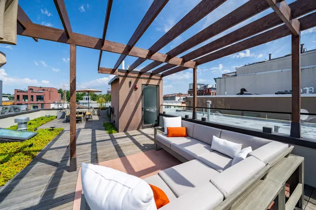 a view of a patio with swimming pool