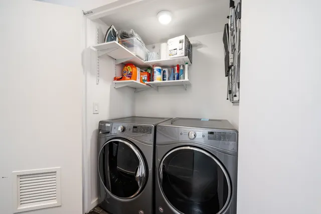 a utility room with dryer and washer
