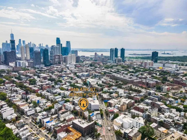 a view of a city with tall buildings