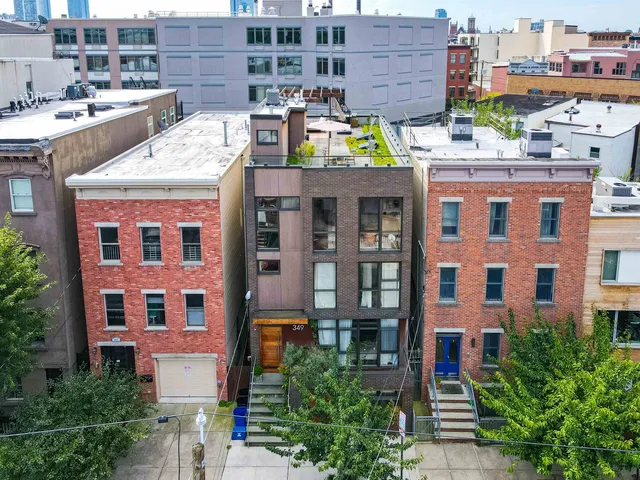 a view of tall building and outdoor space
