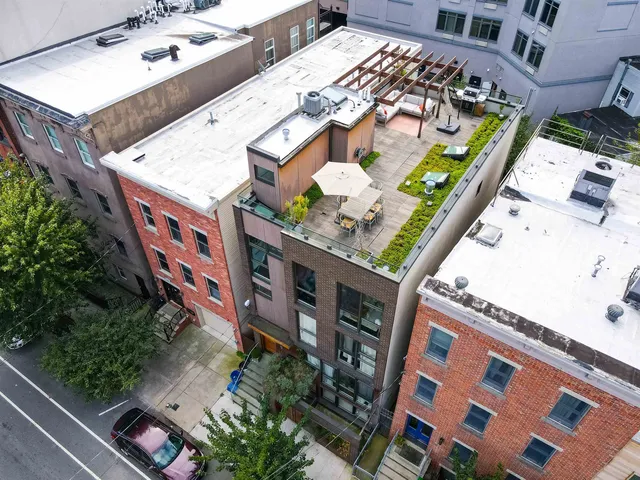 an aerial view of a balcony with outdoor space