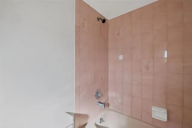 a bathroom with a shower curtain