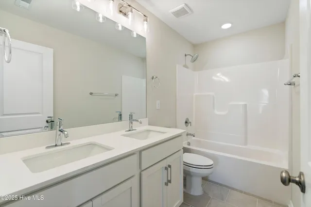 $379,990 | 2009 Twilight Drive Northeast, Winnabow, NC 28479