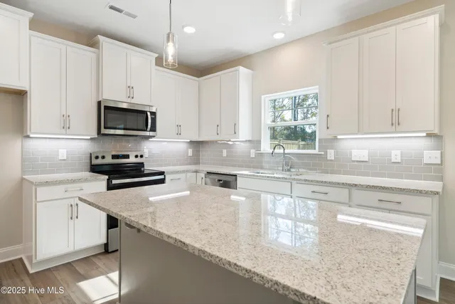 $379,990 | 2009 Twilight Drive Northeast, Winnabow, NC 28479