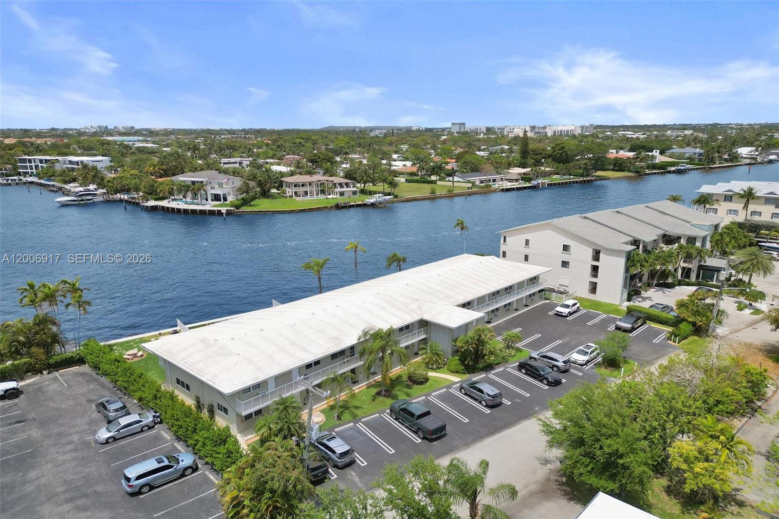 1105 South Riverside Drive, Unit 107 Pompano Beach, FL 33062 - Photo 22 of 31 an aerial view of a house with a garden and lake view