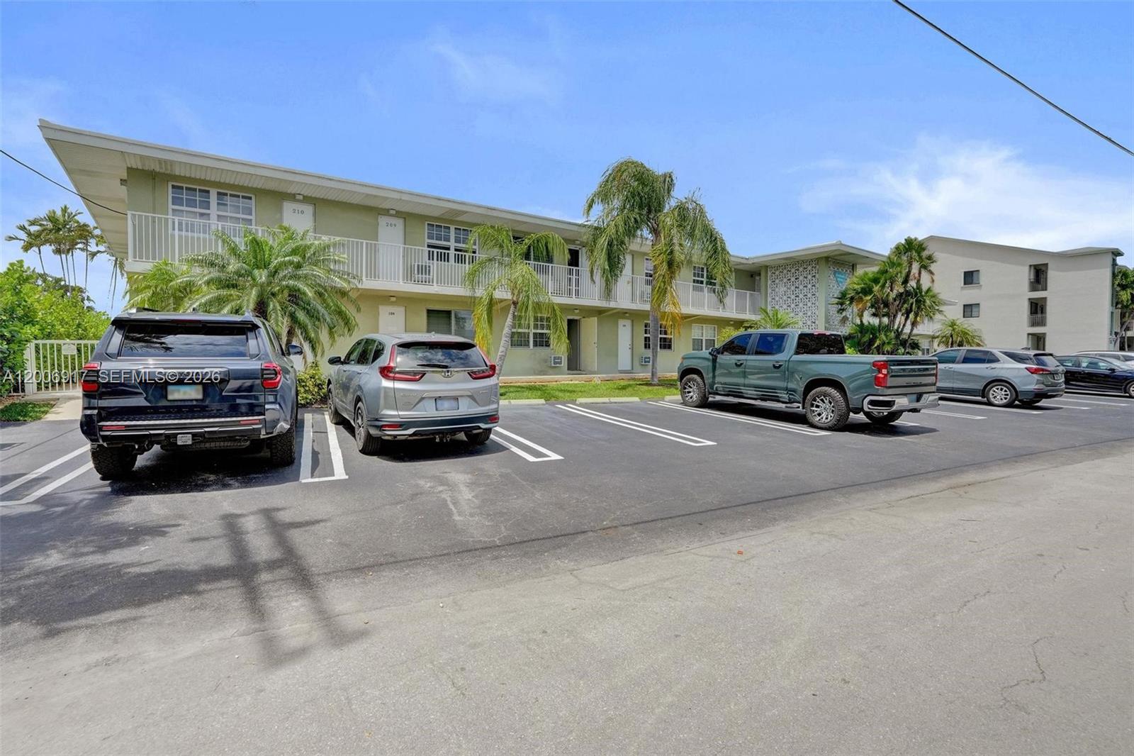1105 South Riverside Drive, Unit 107 Pompano Beach, FL 33062 - Photo 31 of 31 a car parked in front of a house