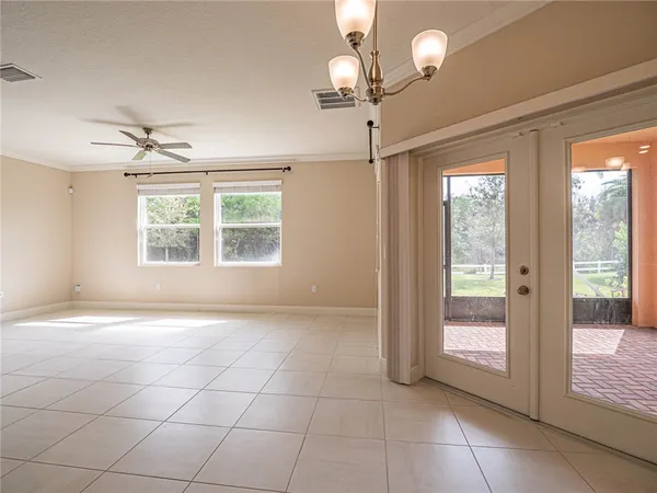 a kitchen with a sink a counter top space and stainless steel appliances