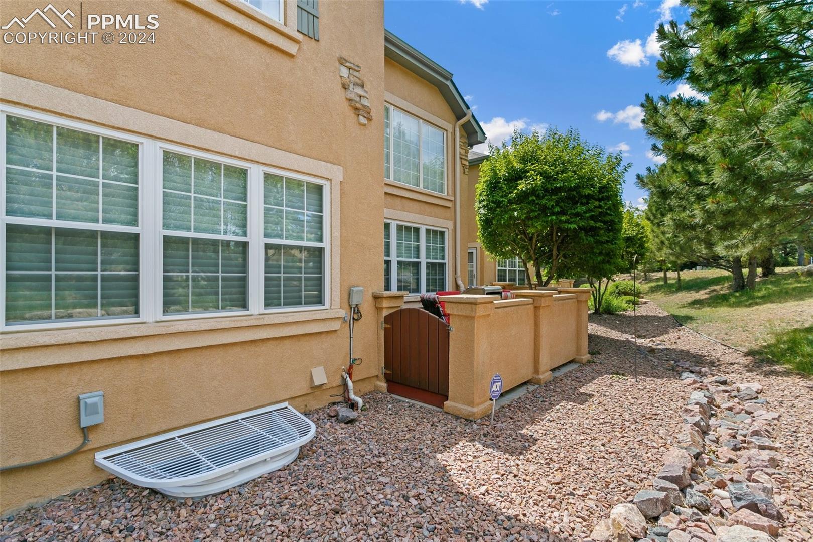5655 Sonnet Ridge Point Colorado Springs, CO 80918 - Photo 35 of 47 View of side of property