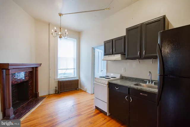 a bathroom with a toilet and a bathtub