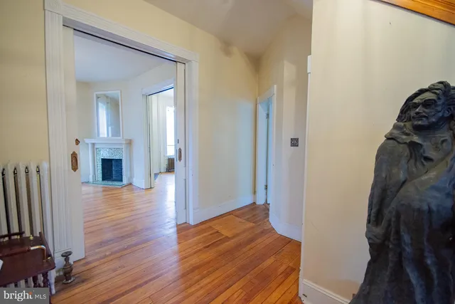a kitchen with granite countertop a refrigerator and a sink