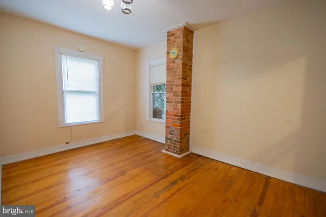 a view of livingroom with washer and dryer