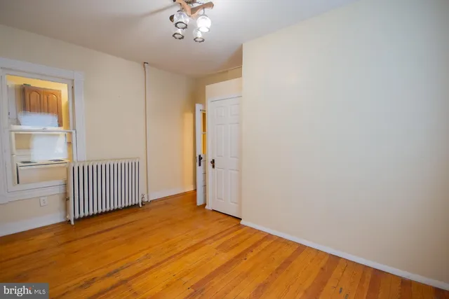 a view of a storage & utility room with washer and dryer