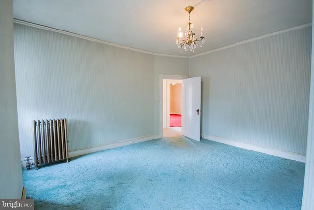 a balcony with wooden floor and fence
