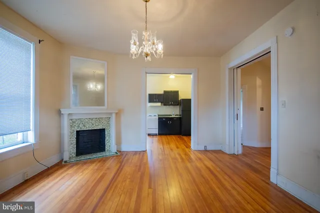 a kitchen with a stove and a refrigerator